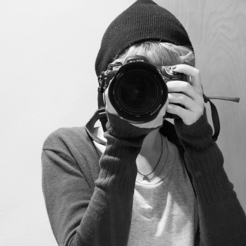 me, pointing my camera at the viewer